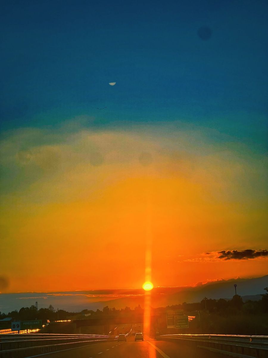 Sunset over the road