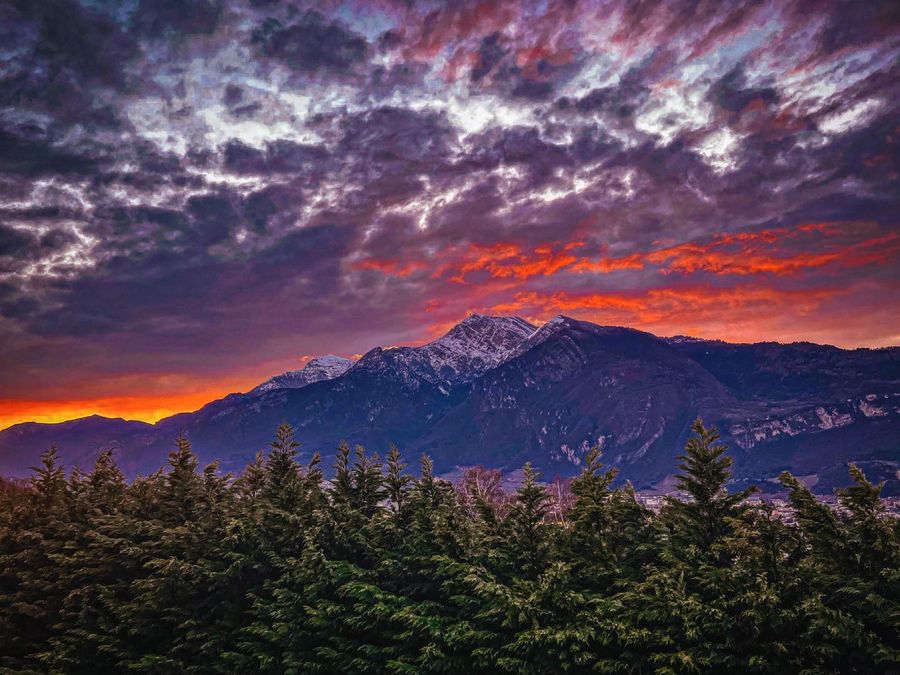 Fire in the sky: winter mountains near Trento